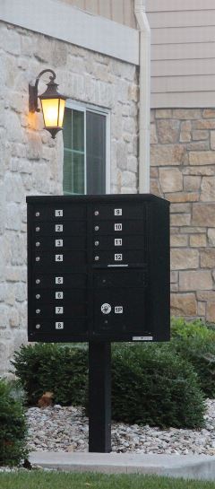 image of a freestanding, pedestal-mounted mailbox