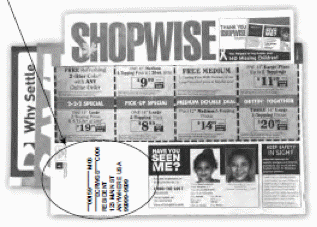 Image of shopping coupon with 8 separate coupons. In addition, there is an image of two missing and exploited children.There is an arrow pointing to illegibly circled text.