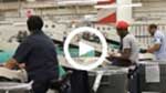 Employees handling mail at a processing facility