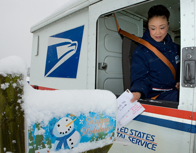 Mail carrier deliver holiday mail