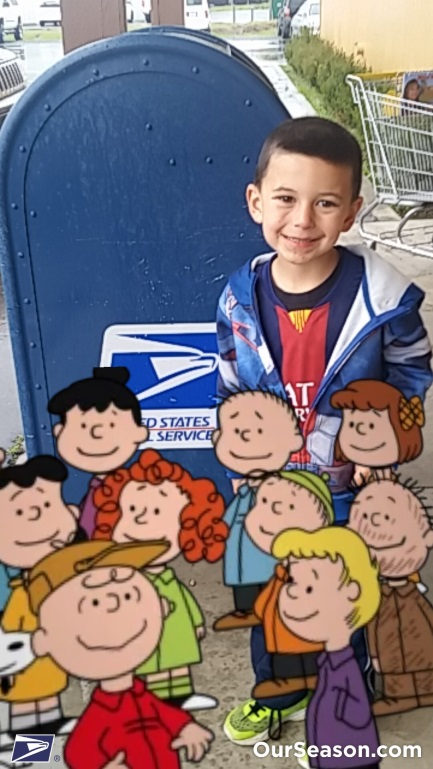 Mokelumne Hill Postmaster’s son Kellen Holland surrounded by Charlie Brown Characters Mokelumne Hill Postmaster’s son Kellen Holland surrounded by Charlie Brown Characters