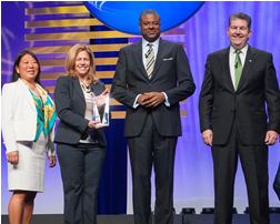 (L-R) Naginsa Manabe, CMO USPS, Julie Loeger, Sr. VP Brand & Acquisition Discover Financial Services , Ronald Stroman, Deputy Postmaster General, Patrick Donohoe, Postmaster General/CEO