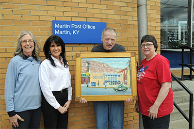 Waldo Dingus holds his rendering of the Martin Post Office 