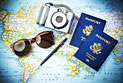 image of Passporsts, camera, sunglasses, and world map
