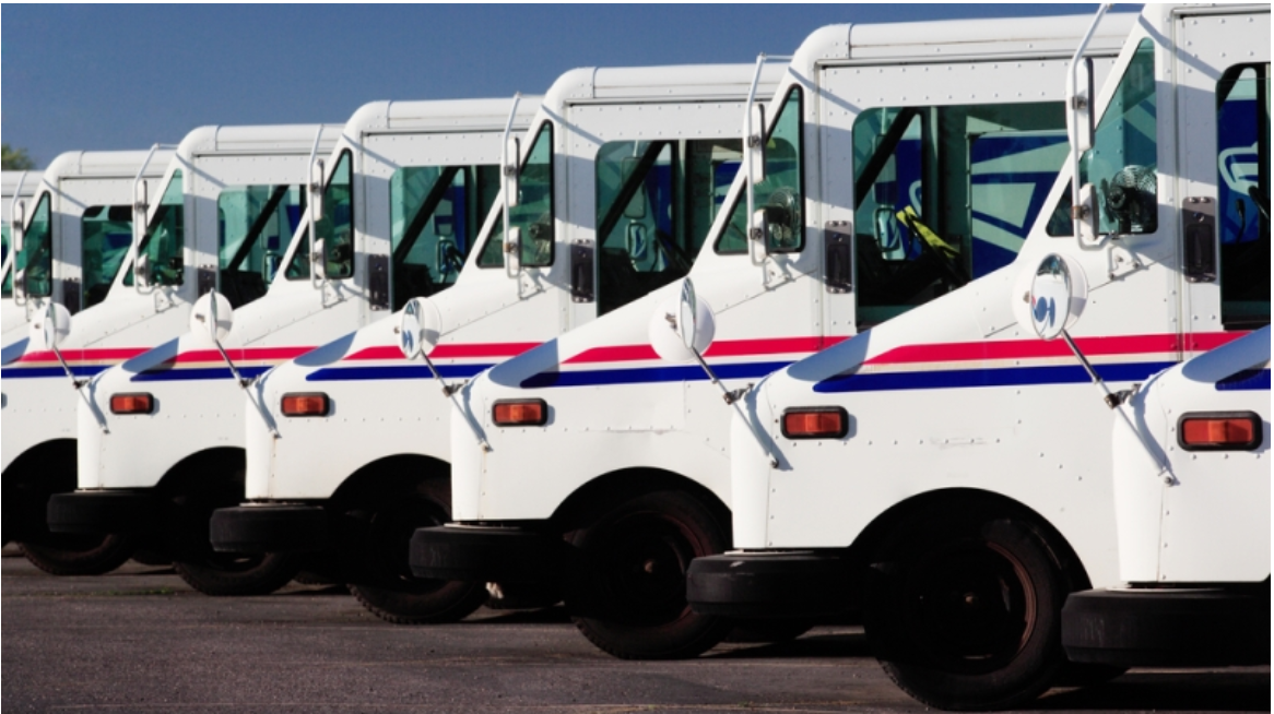 USPS delivery trucks lined up
