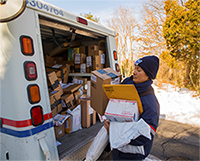 mail carrier delivering packages