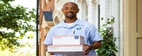 USPS carrier delivering packages