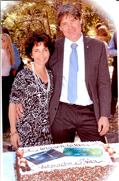 Postmaster John O Reynolds and wife Christine on day he took office in 2012