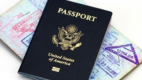 One US Paassport on top of an open Passport book