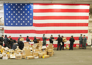 Sailors sort mail aboard USS Bonhomme Richard