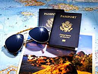 US Passports and shades on a map