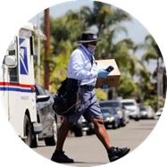 Mail Carrier on her route.