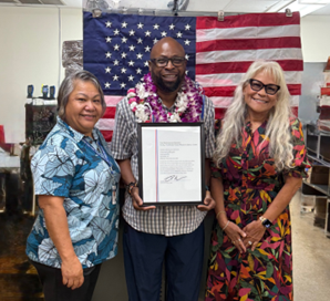 Kalaheo Postmaster David Gillespie (center) with acting Manager Post Office Operations Laroma Parker and Hawaii District Manager Eileen Veach. (USPS)