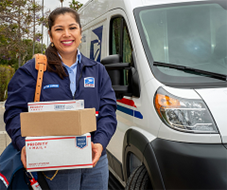 USPS Rural carrier holding packages