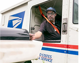 Carrier in truck delivering mail