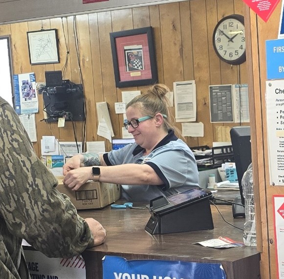 A Retail Clerk at the Lewis Run Post Office