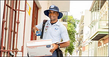 letter carrier delivering packages