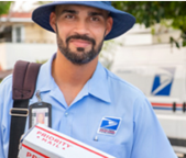 USPS City Carrier delivering mail