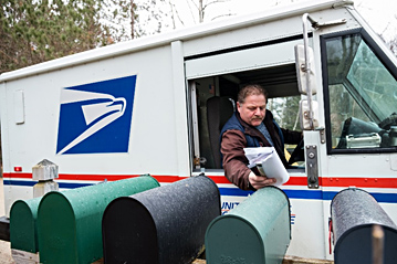 Carrier delivering mail