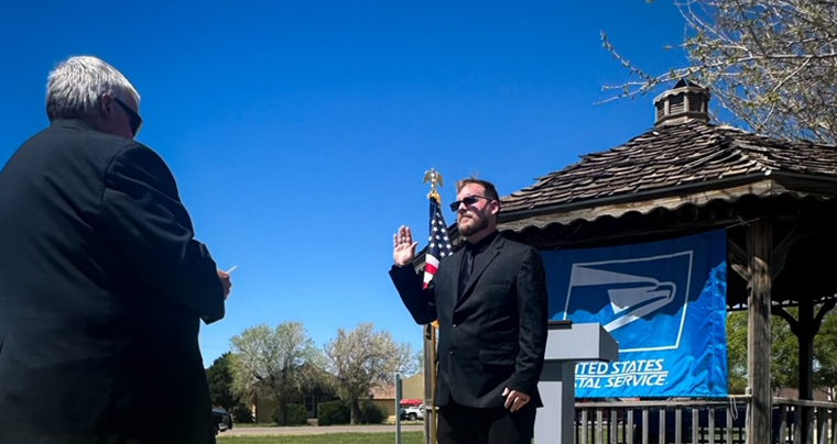 Quaid Chambers, Dumas, TX Postmaster taking oath of office