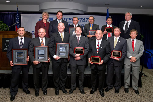 Left to right, front row: Paul Kindzierski, VP Grainger Industrial Supply Sales; W.W. Grainger, Inc. – Supplier Performance Award, Robert Mitchum, CEO; Cleanwise, LLC – Supplier Performance Award, David Young, CEO Coventry Healthcare, Inc.; First Script Network Services – Supplier Performance Award, Ted Shelton, General Manager; Tarheel Paper and Supply Company – Supplier Excellence Award, Frank Barretta, Executive VP; Cleanwise, LLC – Supplier Diversity Award, Rob Laughlin, VP Government Sales; W.W. Grainger, Inc. – Postal Supplier Council Excellence Award, Joseph Corbett, USPS CFO and Executive VP  			Left to right, back row: Susan M. Brownell, USPS VP Supply Management, Ben Graham, VP; Bell Incorporated – Supplier Sustainability Excellence Award, David Wheeler, President & CEO; Wheeler Bros., Inc. – Supplier Performance Award, Eric Lawton, VP; BGA, Inc. – Supplier Excellence Award, Royce Graham, Executive VP; Western Industrial Contractors – Supplier Excellence Award, John E. Potter, USPS Postmaster General & CEO