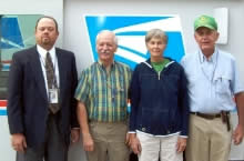 (left to right) - Enfield Postmaster Kenneth C. Whitaker, Rural Letter Carriers Arthur T. Neville, Ann Pyatte, and Lafayette (Fate) Bunch.