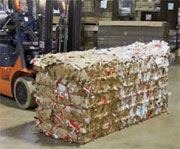 Forklift moving recyclable waste