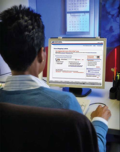 Customer at computer using usps.com