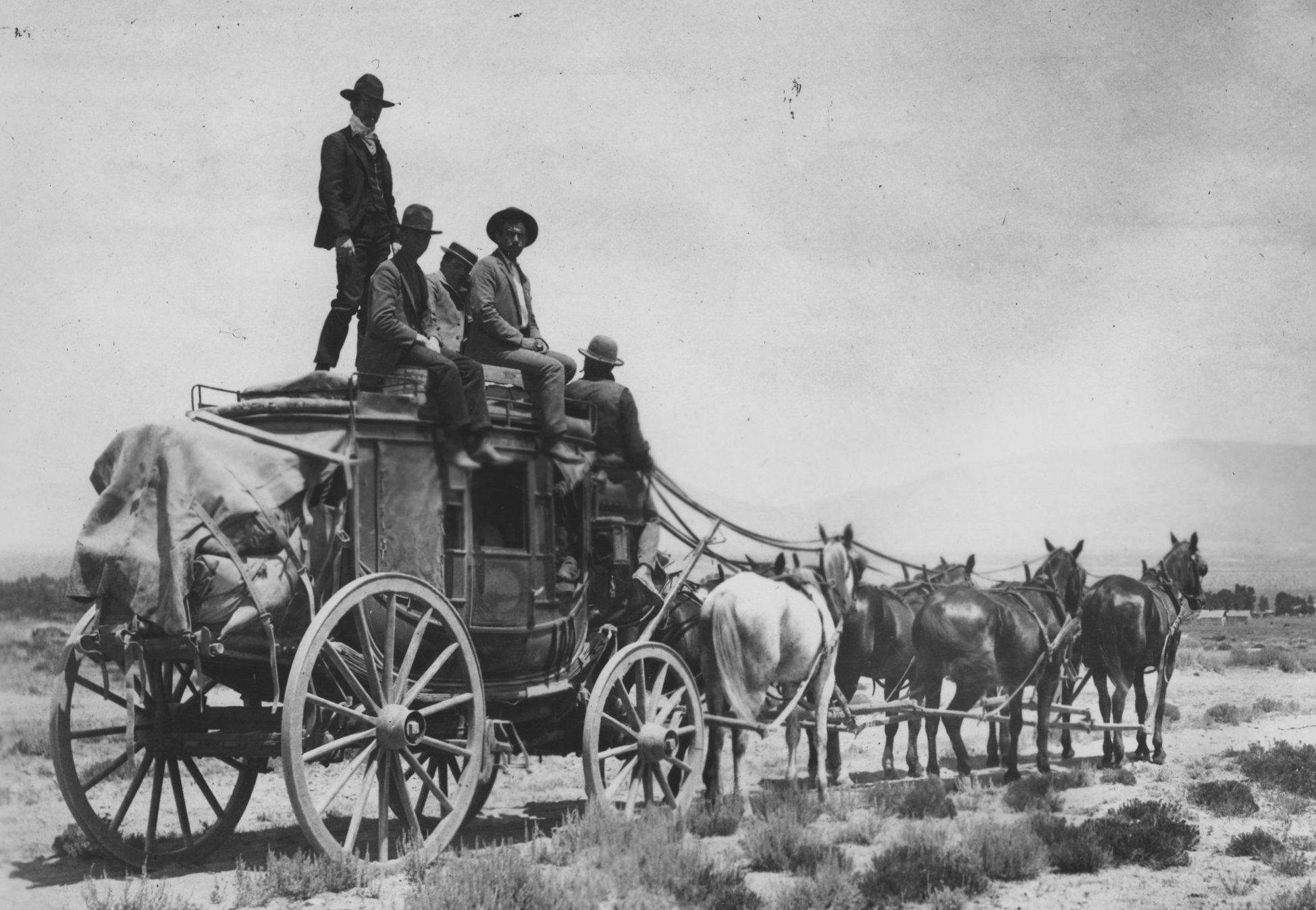Circa 1900 photograph of stagecoach being pulled by six horses.
