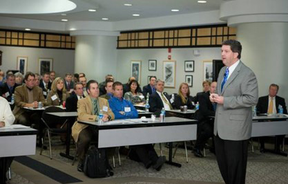 Deputy Postmaster General and COO, Pat Donahoe, speaks to the Postal Supplier Council on December 1, 2009.