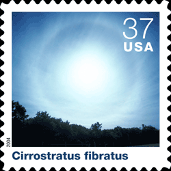 Individual stamp background, Cirrostratus fibratus, followed by text that identifies and describes thet particular could type.