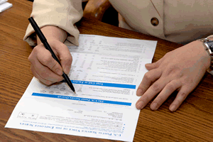 image of employee filling out VOE