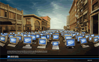 image of hundreds of computers in the street and the monitor displaying the USPS logo.