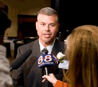 Kennebunk, 
          ME, Letter Carrier David Heald speaks with reporters after being named 
          NALC National Hero of the Year.