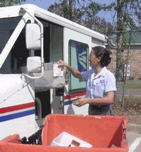 Bay 
          St. Louis, MS, Letter Carrier Micki Clifton is back on the job after a harrowing experience riding out Hurricane Katrina on a rooftop.