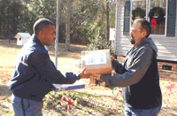 Image of Postal Carrier Calvin Lattimer and Postal Customer Micheal Dowd