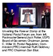 Unveiling the Forever Stamp at the National Postal Forum are, from left, Postmaster General Jack Potter, USPS Board of Governors Chairman James C. Miller III, Postal Regulatory Commission (PRC) member Ruth Goldway and PRC Chairman Dan Blair.