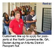 Customers line up to apply for passports at the North Lawrenceville, GA, Station during an Atlanta District Passport Fair.