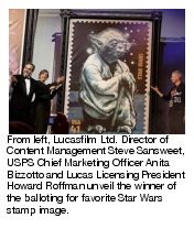 From left, Lucasfilm Ltd. Director of Content Management Steve Sansweet, USPS Chief Marketing Officer Anita Bizzotto and Lucas Licensing President Howard Roffman unveil the winner of the balloting for favorite Star Wars stamp image.