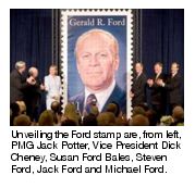 Unveiling the Ford stamp are, from left, PMG Jack Potter, Vice President Dick Cheney, Susan Ford Bales, Steven Ford, Jack Ford and Michael Ford.