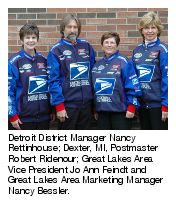 Detroit District Manager Nancy Rettinghouse; Dexter, MI, Postmaster Robert Ridenour; Great Lakes Area Vice President, Jo Ann Feindt and Great Lakes Area Marketing Manager Nancy Bessler.