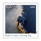 Butte in the early morning stamp