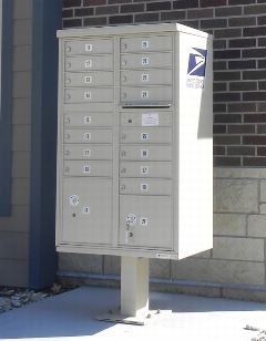 image of a pedestal, freestanding mail delivery receptacle