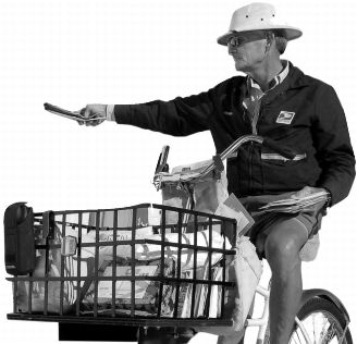 image of postal worker delivering mail from a bicycle