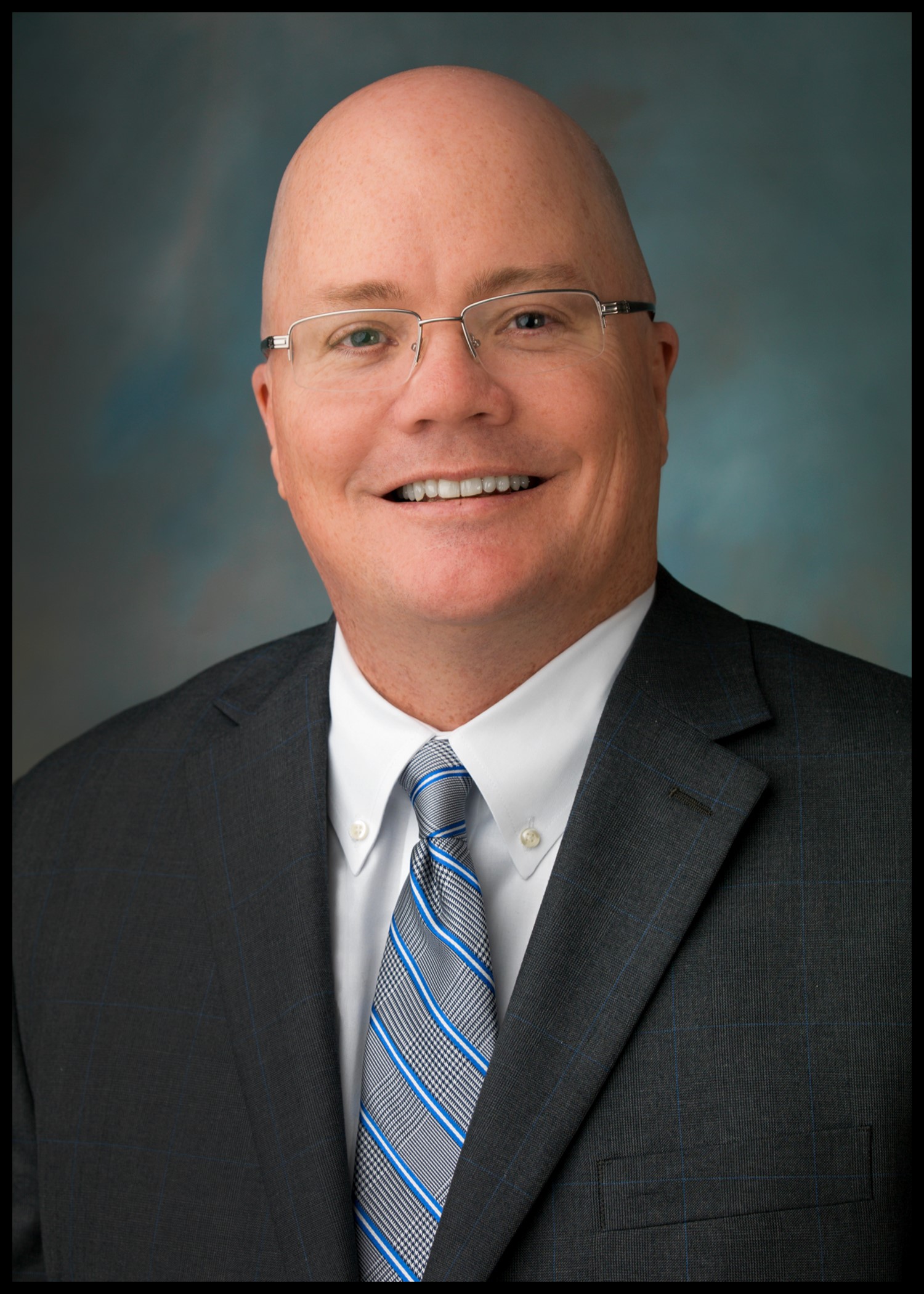 David E. Williams, Chief Logistics and Processing Operations Officer and Executive Vice President