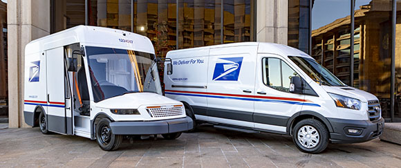 Two USPS Modern Postal Vehicles