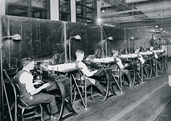 Employees running a sorting machine